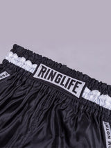 RINGLIFE Muay Thai Shorts, Label, schwarz