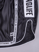 RINGLIFE Muay Thai Shorts, Label, schwarz