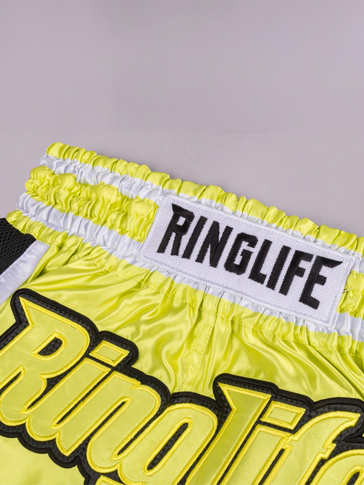 RINGLIFE Muay Thai Shorts, Represent, gelb-schwarz