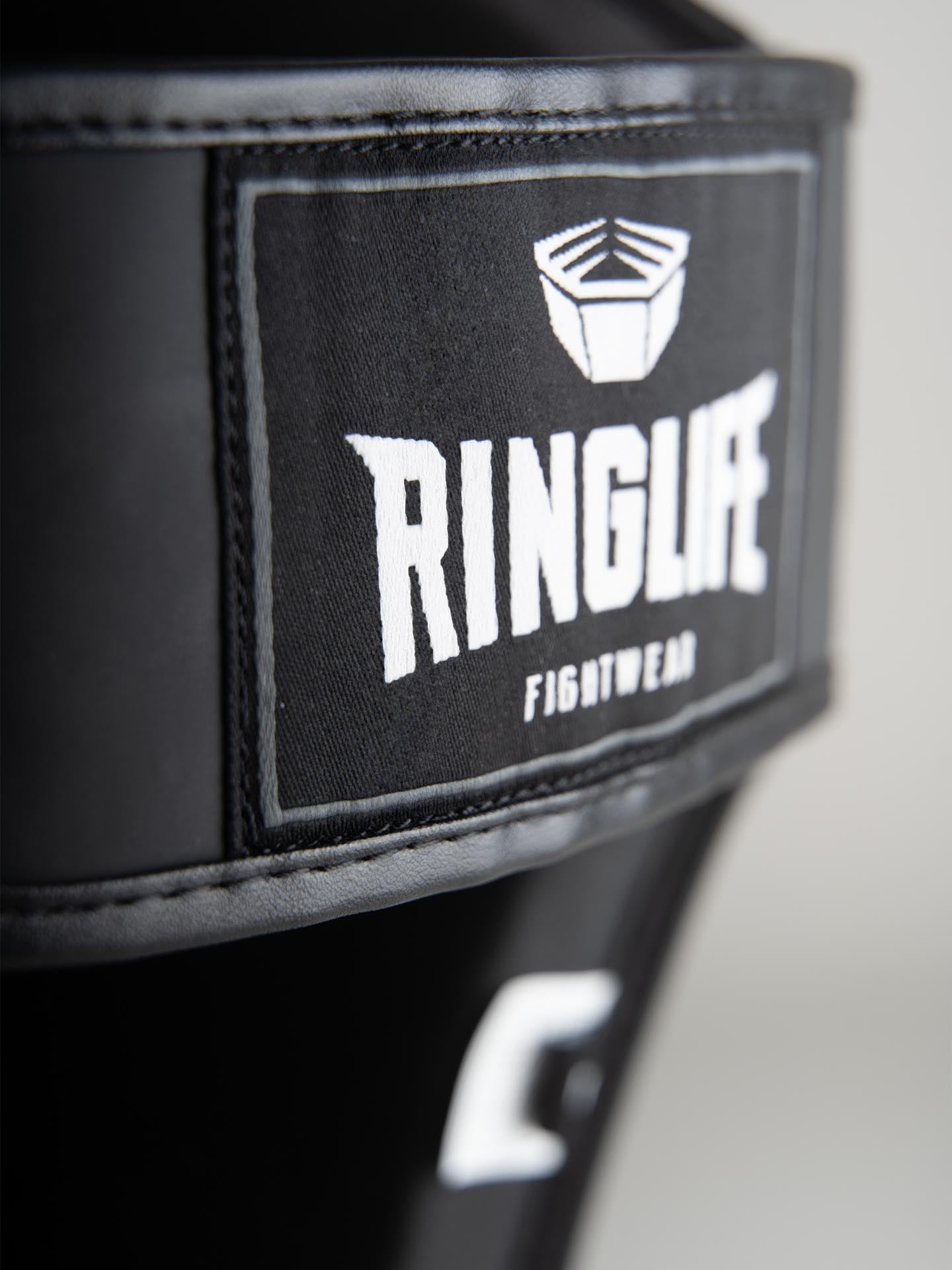 RINGLIFE Schienbeinschoner - No.1 schwarz-weiß